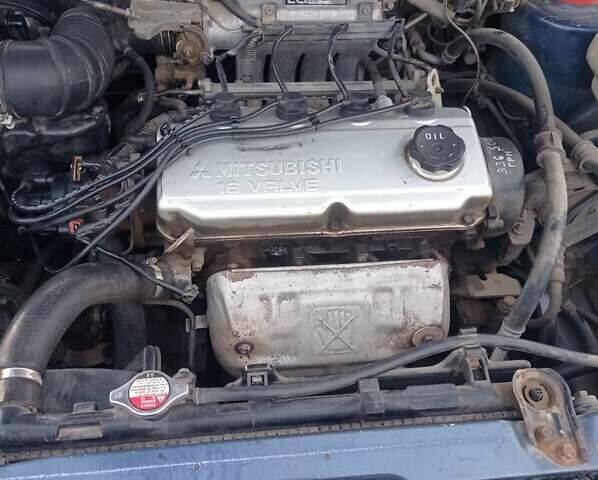 Синій Міцубісі Спейс Раннер, об'ємом двигуна 1.8 л та пробігом 390 тис. км за 2700 $, фото 20 на Automoto.ua