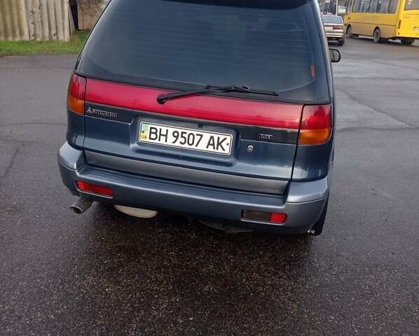 Синій Міцубісі Спейс Раннер, об'ємом двигуна 1.8 л та пробігом 390 тис. км за 2700 $, фото 1 на Automoto.ua