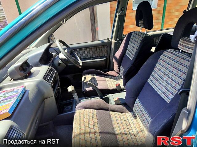 Зеленый Мицубиси Спейс Раннер, объемом двигателя 2 л и пробегом 422 тыс. км за 3200 $, фото 4 на Automoto.ua