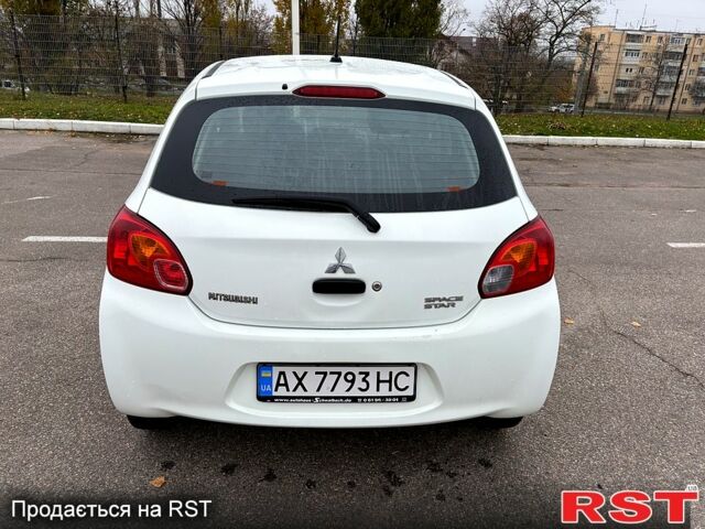 Білий Міцубісі Спейс Стар, об'ємом двигуна 1 л та пробігом 72 тис. км за 5600 $, фото 7 на Automoto.ua