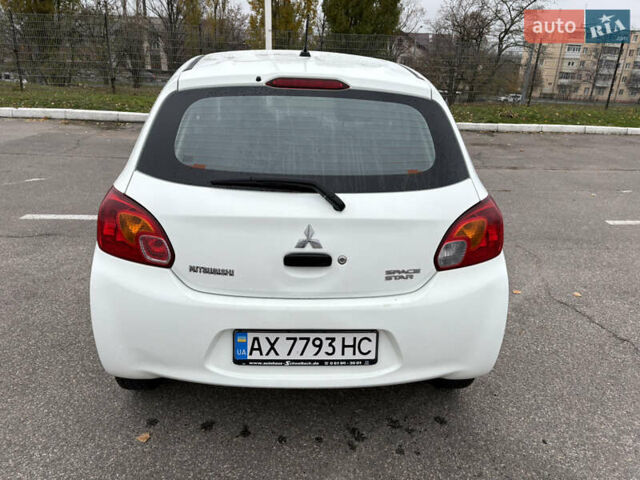 Білий Міцубісі Спейс Стар, об'ємом двигуна 1 л та пробігом 72 тис. км за 5600 $, фото 2 на Automoto.ua