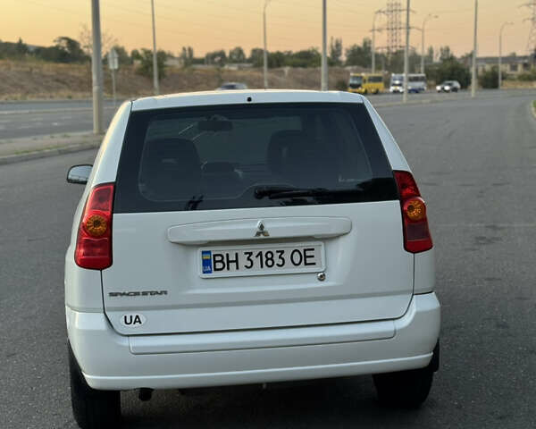 Білий Міцубісі Спейс Стар, об'ємом двигуна 1.58 л та пробігом 319 тис. км за 3700 $, фото 23 на Automoto.ua