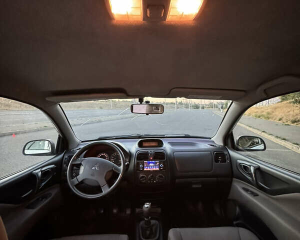 Белый Мицубиси Спейс Стар, объемом двигателя 1.6 л и пробегом 319 тыс. км за 2950 $, фото 26 на Automoto.ua