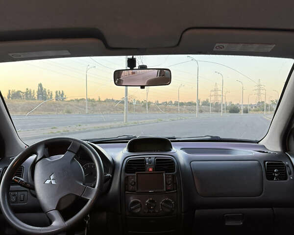 Белый Мицубиси Спейс Стар, объемом двигателя 1.6 л и пробегом 319 тыс. км за 2950 $, фото 27 на Automoto.ua