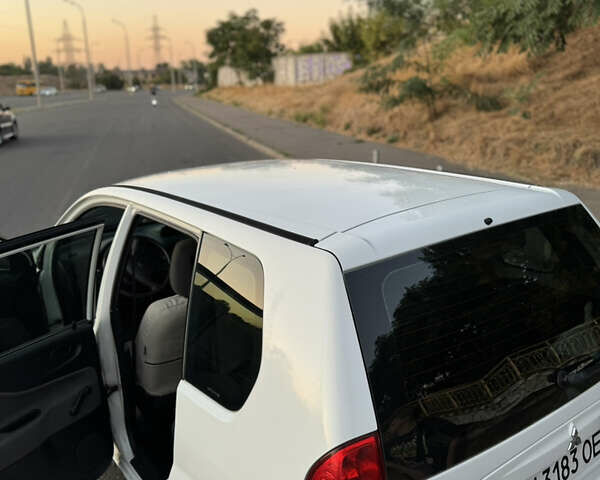 Белый Мицубиси Спейс Стар, объемом двигателя 1.6 л и пробегом 319 тыс. км за 2950 $, фото 31 на Automoto.ua