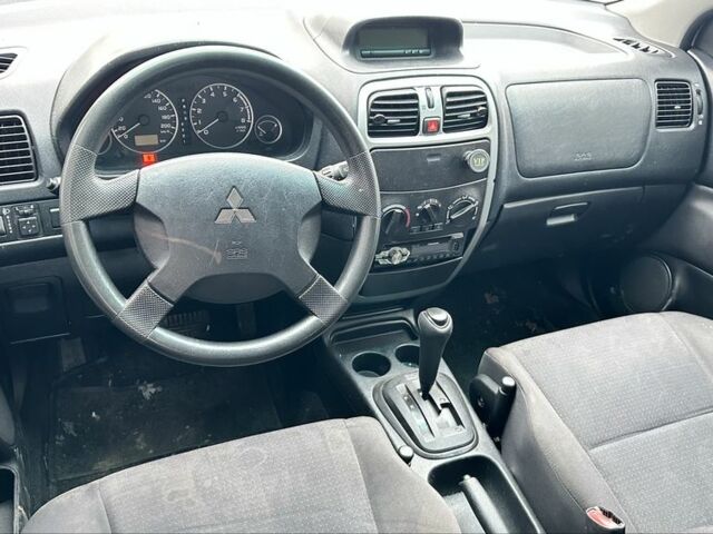 Білий Міцубісі Спейс Стар, об'ємом двигуна 1.6 л та пробігом 190 тис. км за 1700 $, фото 3 на Automoto.ua