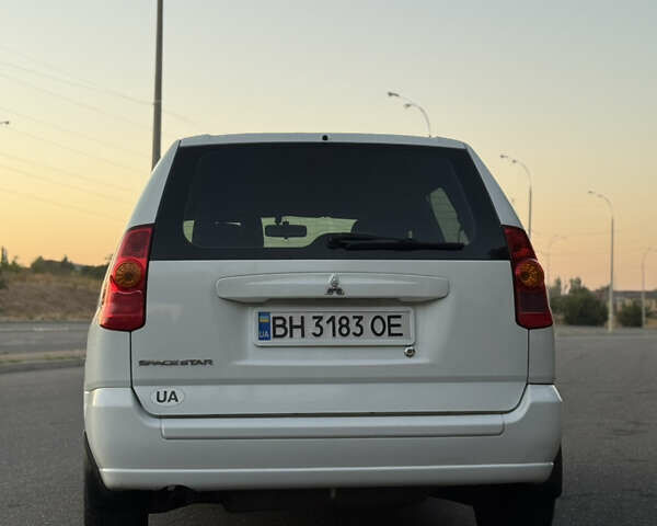 Белый Мицубиси Спейс Стар, объемом двигателя 1.6 л и пробегом 319 тыс. км за 2950 $, фото 3 на Automoto.ua
