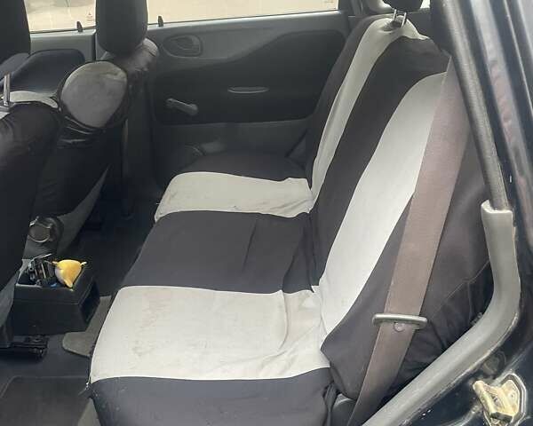 Черный Мицубиси Спейс Стар, объемом двигателя 1.3 л и пробегом 300 тыс. км за 2500 $, фото 5 на Automoto.ua