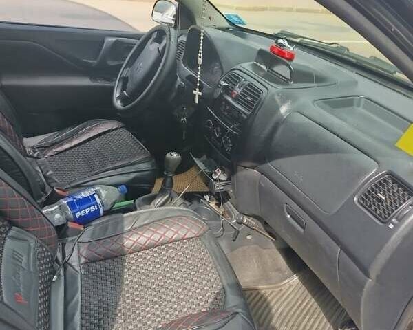 Чорний Міцубісі Спейс Стар, об'ємом двигуна 1.6 л та пробігом 210 тис. км за 2000 $, фото 3 на Automoto.ua