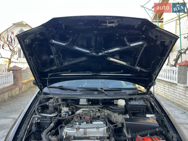 Чорний Міцубісі Спейс Стар, об'ємом двигуна 1.6 л та пробігом 300 тис. км за 2750 $, фото 48 на Automoto.ua