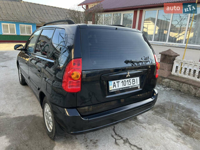 Чорний Міцубісі Спейс Стар, об'ємом двигуна 1.6 л та пробігом 300 тис. км за 2750 $, фото 16 на Automoto.ua