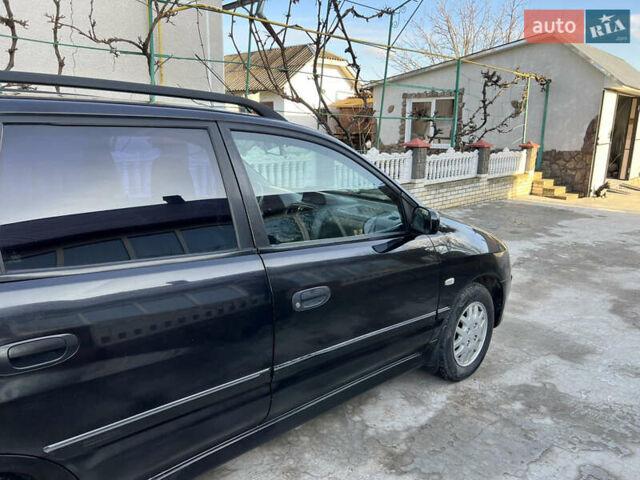 Чорний Міцубісі Спейс Стар, об'ємом двигуна 1.6 л та пробігом 300 тис. км за 2750 $, фото 12 на Automoto.ua