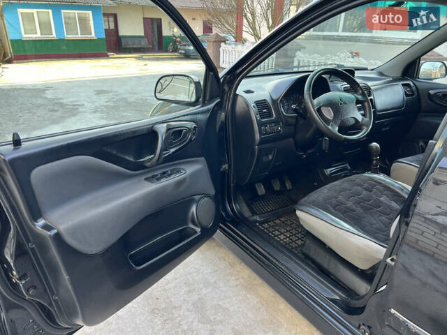Чорний Міцубісі Спейс Стар, об'ємом двигуна 1.6 л та пробігом 300 тис. км за 2750 $, фото 25 на Automoto.ua
