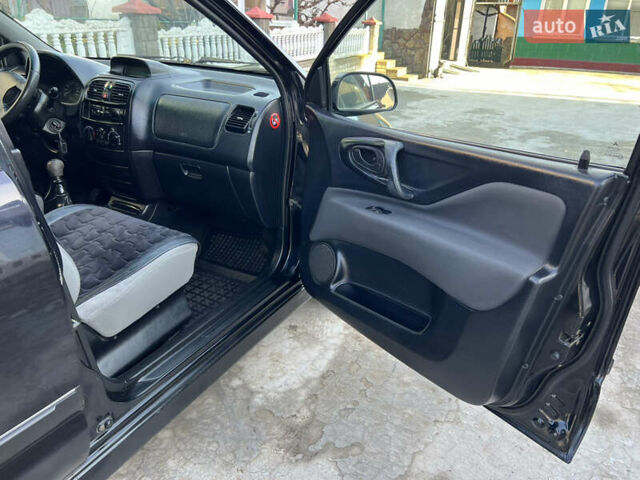 Чорний Міцубісі Спейс Стар, об'ємом двигуна 1.6 л та пробігом 300 тис. км за 2750 $, фото 34 на Automoto.ua