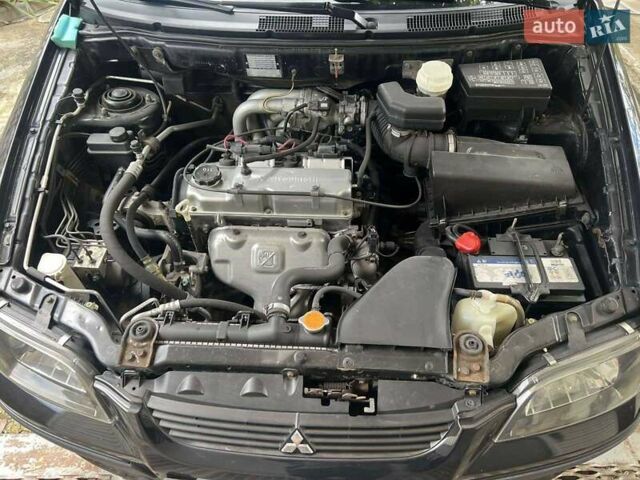 Чорний Міцубісі Спейс Стар, об'ємом двигуна 1.6 л та пробігом 153 тис. км за 4800 $, фото 3 на Automoto.ua