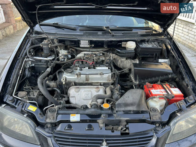 Чорний Міцубісі Спейс Стар, об'ємом двигуна 1.6 л та пробігом 300 тис. км за 2750 $, фото 47 на Automoto.ua