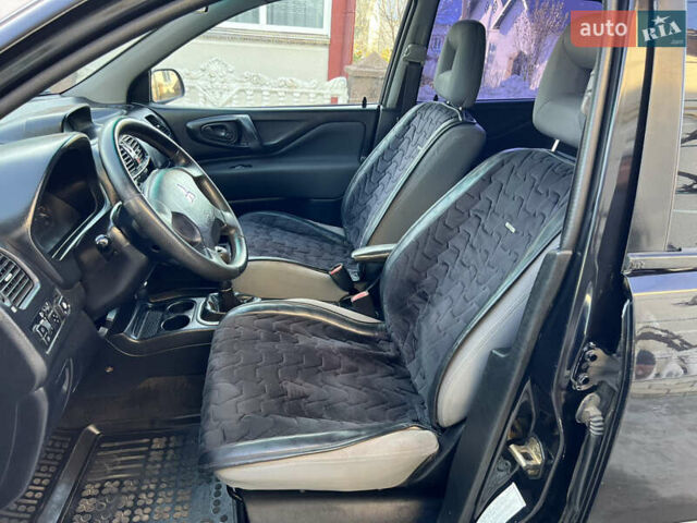 Чорний Міцубісі Спейс Стар, об'ємом двигуна 1.6 л та пробігом 300 тис. км за 2750 $, фото 27 на Automoto.ua