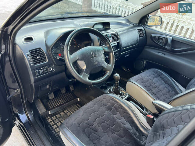 Чорний Міцубісі Спейс Стар, об'ємом двигуна 1.6 л та пробігом 300 тис. км за 2750 $, фото 29 на Automoto.ua