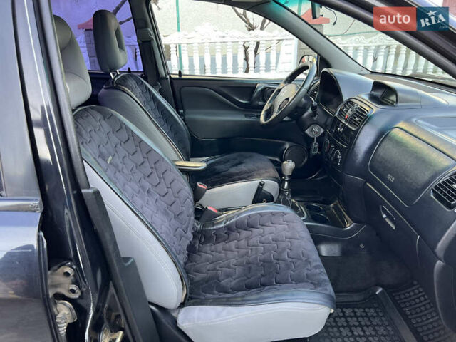 Чорний Міцубісі Спейс Стар, об'ємом двигуна 1.6 л та пробігом 300 тис. км за 2750 $, фото 38 на Automoto.ua