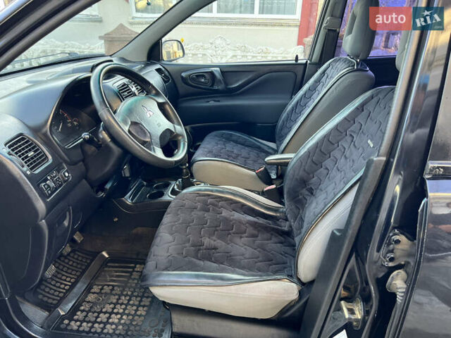 Чорний Міцубісі Спейс Стар, об'ємом двигуна 1.6 л та пробігом 300 тис. км за 2750 $, фото 26 на Automoto.ua