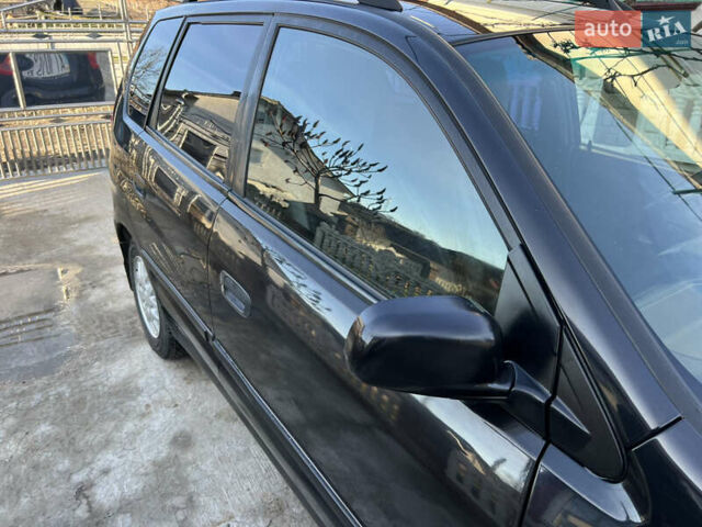 Чорний Міцубісі Спейс Стар, об'ємом двигуна 1.6 л та пробігом 300 тис. км за 2750 $, фото 20 на Automoto.ua