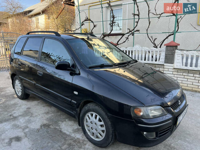Чорний Міцубісі Спейс Стар, об'ємом двигуна 1.6 л та пробігом 300 тис. км за 2750 $, фото 11 на Automoto.ua