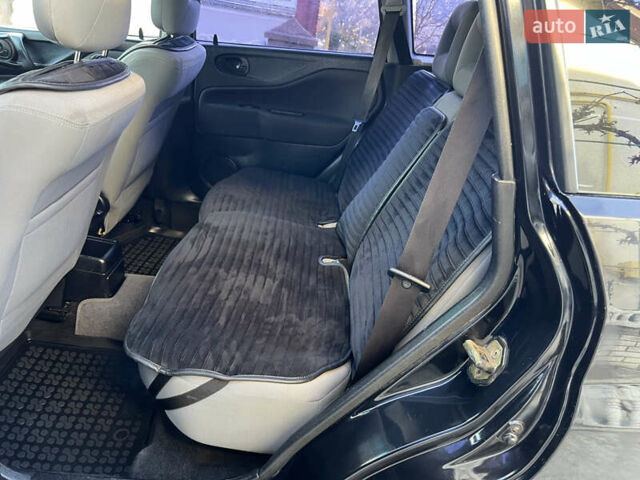 Чорний Міцубісі Спейс Стар, об'ємом двигуна 1.6 л та пробігом 300 тис. км за 2750 $, фото 33 на Automoto.ua