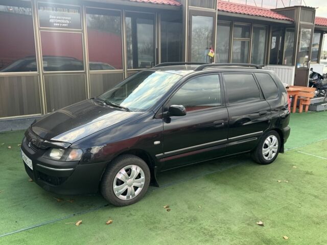 Черный Мицубиси Спейс Стар, объемом двигателя 1.8 л и пробегом 190 тыс. км за 3250 $, фото 2 на Automoto.ua