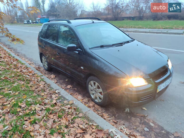 Черный Мицубиси Спейс Стар, объемом двигателя 1.9 л и пробегом 401 тыс. км за 3200 $, фото 1 на Automoto.ua