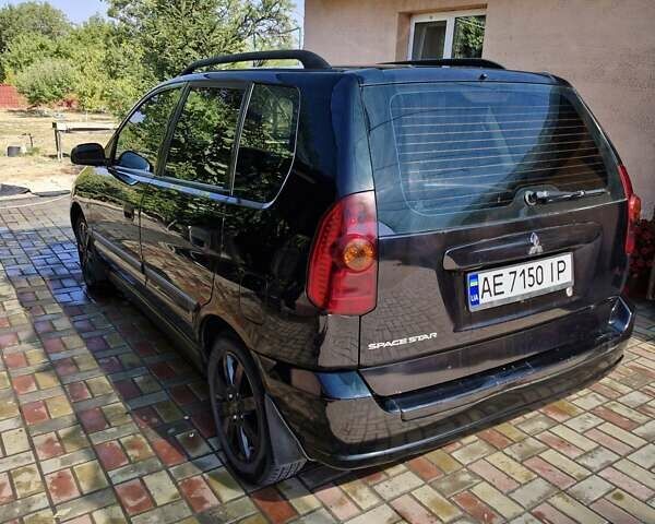Чорний Міцубісі Спейс Стар, об'ємом двигуна 1.6 л та пробігом 240 тис. км за 5000 $, фото 1 на Automoto.ua