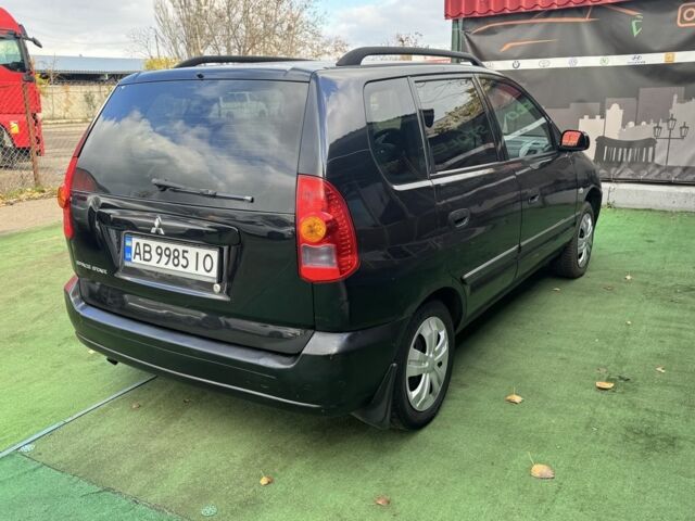 Черный Мицубиси Спейс Стар, объемом двигателя 1.8 л и пробегом 190 тыс. км за 3250 $, фото 3 на Automoto.ua