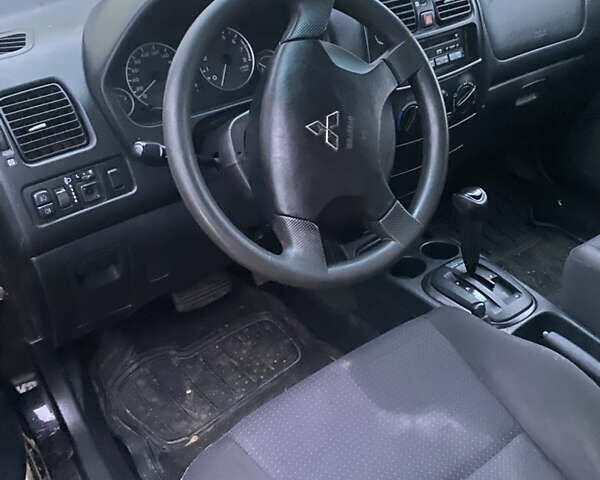 Черный Мицубиси Спейс Стар, объемом двигателя 0 л и пробегом 250 тыс. км за 2400 $, фото 6 на Automoto.ua