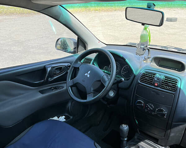 Міцубісі Спейс Стар 2004 у Києві на Automoto.ua Чорний Міцубісі Спейс Стар, об'ємом двигуна 1.6 л та пробігом 275 тис. км за 3500 $, фото 5 на Automoto.ua