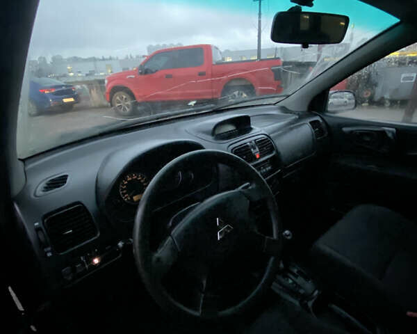 Черный Мицубиси Спейс Стар, объемом двигателя 0 л и пробегом 250 тыс. км за 2400 $, фото 8 на Automoto.ua