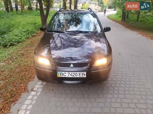 Черный Мицубиси Спейс Стар, объемом двигателя 1.6 л и пробегом 250 тыс. км за 2300 $, фото 6 на Automoto.ua