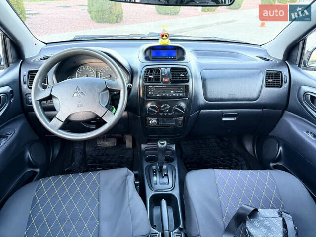 Черный Мицубиси Спейс Стар, объемом двигателя 1.83 л и пробегом 190 тыс. км за 2800 $, фото 6 на Automoto.ua