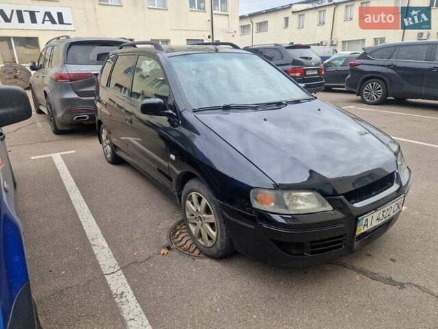 Міцубісі Спейс Стар 2004 у Києві на Automoto.ua Чорний Міцубісі Спейс Стар, об'ємом двигуна 1.8 л та пробігом 250 тис. км за 2000 $, фото 1 на Automoto.ua
