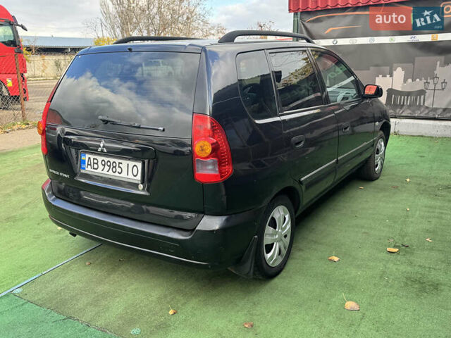 Черный Мицубиси Спейс Стар, объемом двигателя 1.83 л и пробегом 190 тыс. км за 2800 $, фото 1 на Automoto.ua