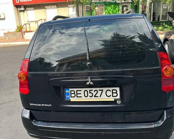 Черный Мицубиси Спейс Стар, объемом двигателя 1.8 л и пробегом 170 тыс. км за 3500 $, фото 4 на Automoto.ua
