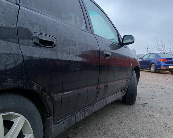 Черный Мицубиси Спейс Стар, объемом двигателя 0 л и пробегом 250 тыс. км за 2400 $, фото 4 на Automoto.ua