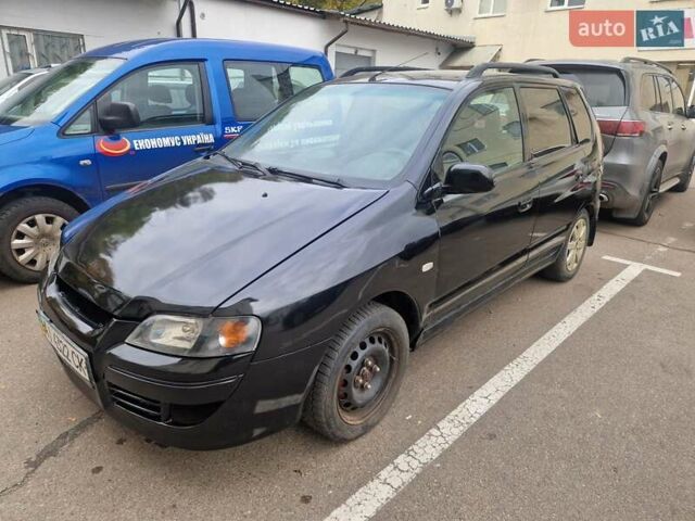 Міцубісі Спейс Стар 2004 у Києві на Automoto.ua Чорний Міцубісі Спейс Стар, об'ємом двигуна 1.8 л та пробігом 250 тис. км за 2000 $, фото 3 на Automoto.ua