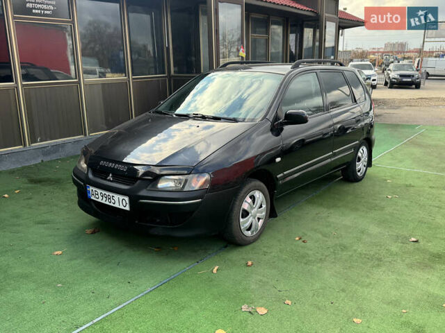Черный Мицубиси Спейс Стар, объемом двигателя 1.83 л и пробегом 190 тыс. км за 2800 $, фото 3 на Automoto.ua