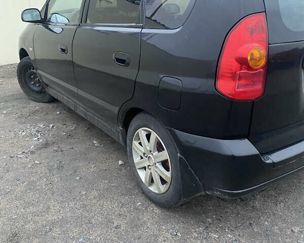 Черный Мицубиси Спейс Стар, объемом двигателя 0 л и пробегом 250 тыс. км за 2700 $, фото 3 на Automoto.ua