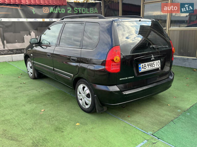 Черный Мицубиси Спейс Стар, объемом двигателя 1.83 л и пробегом 190 тыс. км за 2800 $, фото 2 на Automoto.ua