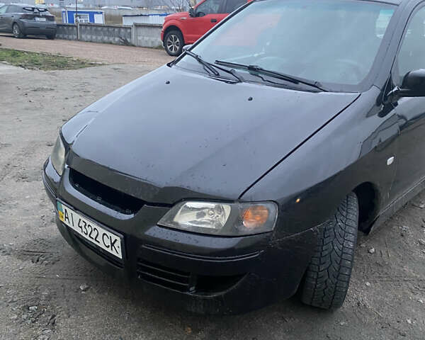 Черный Мицубиси Спейс Стар, объемом двигателя 0 л и пробегом 250 тыс. км за 2400 $, фото 1 на Automoto.ua