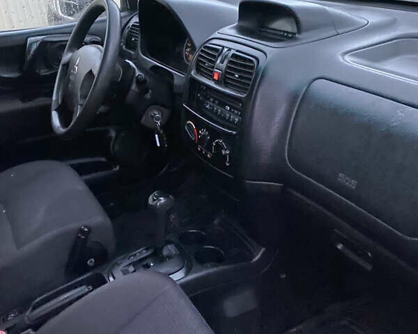 Чорний Міцубісі Спейс Стар, об'ємом двигуна 1.8 л та пробігом 400 тис. км за 2000 $, фото 5 на Automoto.ua