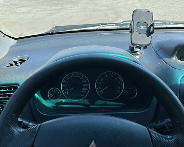 Міцубісі Спейс Стар 2004 у Києві на Automoto.ua Чорний Міцубісі Спейс Стар, об'ємом двигуна 1.6 л та пробігом 275 тис. км за 3500 $, фото 6 на Automoto.ua