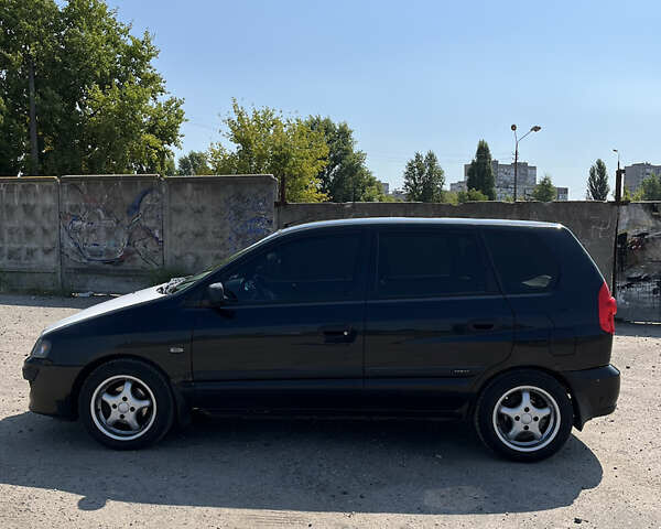 Міцубісі Спейс Стар 2004 у Києві на Automoto.ua Чорний Міцубісі Спейс Стар, об'ємом двигуна 1.6 л та пробігом 275 тис. км за 3500 $, фото 1 на Automoto.ua