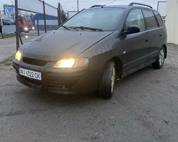 Черный Мицубиси Спейс Стар, объемом двигателя 0 л и пробегом 250 тыс. км за 2400 $, фото 1 на Automoto.ua