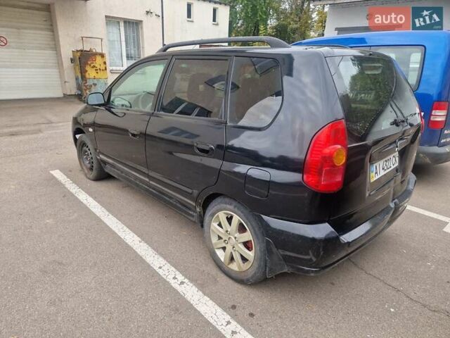Міцубісі Спейс Стар 2004 у Києві на Automoto.ua Чорний Міцубісі Спейс Стар, об'ємом двигуна 1.8 л та пробігом 250 тис. км за 2000 $, фото 5 на Automoto.ua